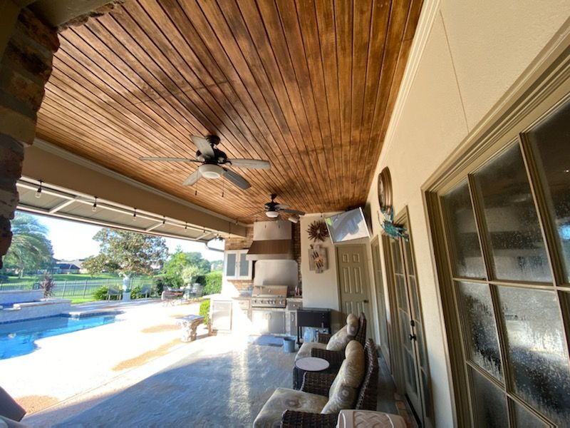 Ceiling fan installed on a covered patio in Louisiana.